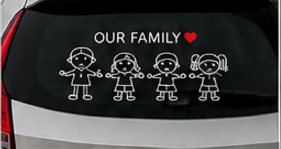 Our Family stick-figure decal applied to the rear window of a white car.